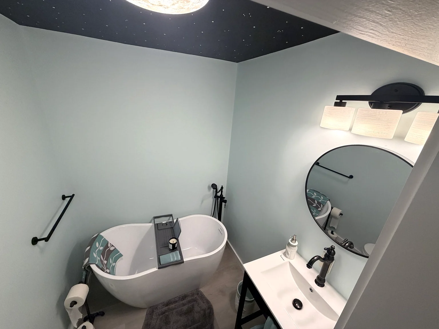 Bathroom with floral feature wall