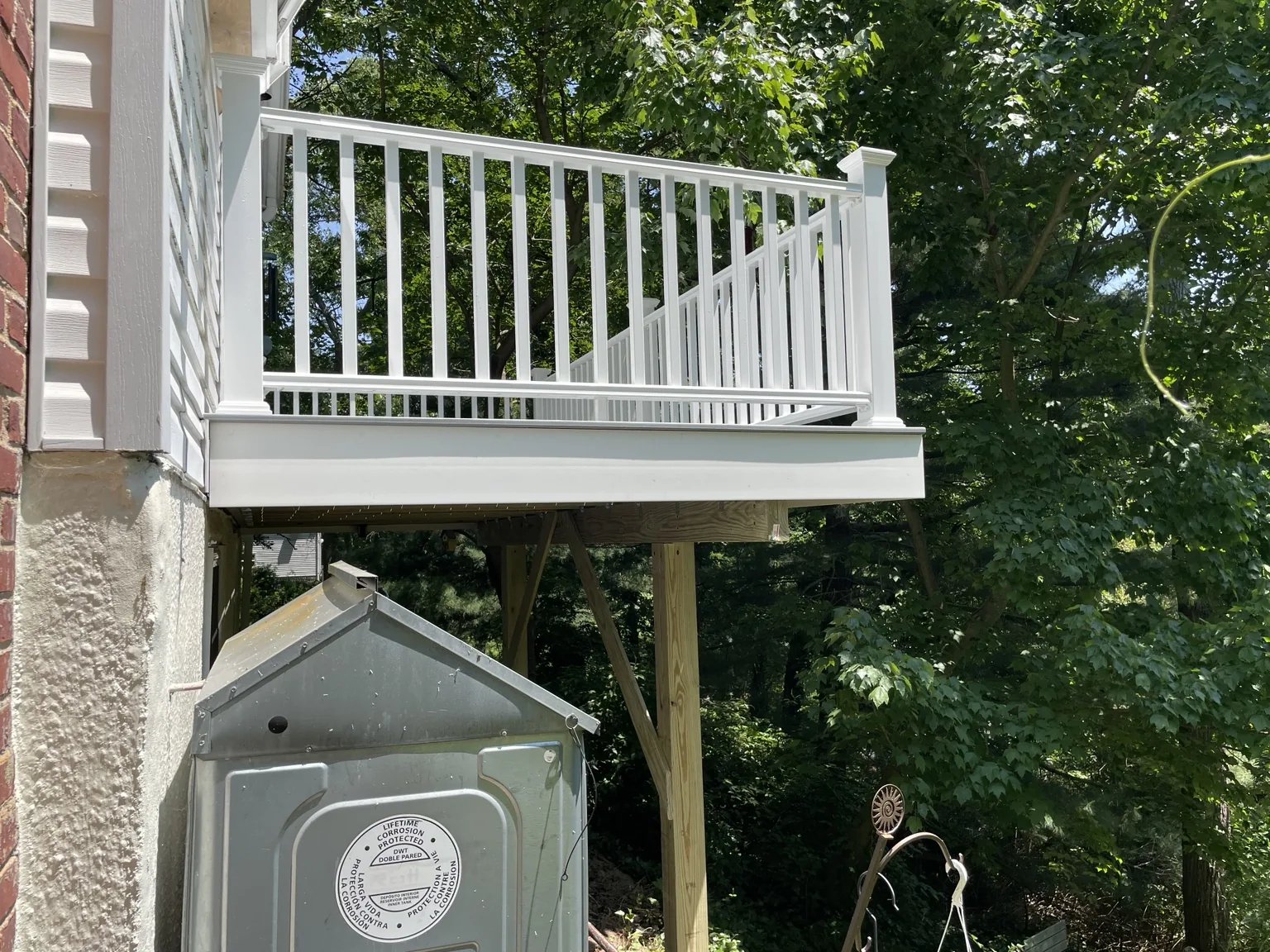 White exterior deck railing