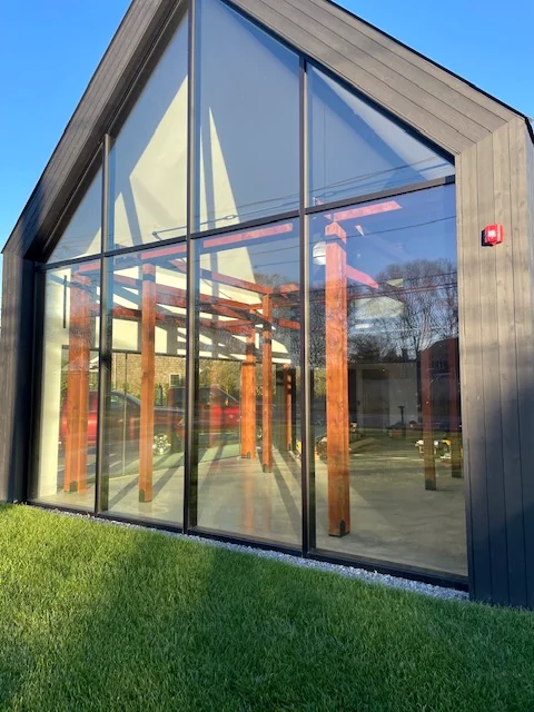 Finished glass exterior with visible timber frame